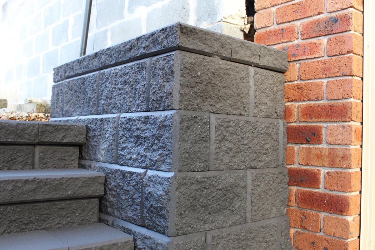 Concrete block retaining wall and steps