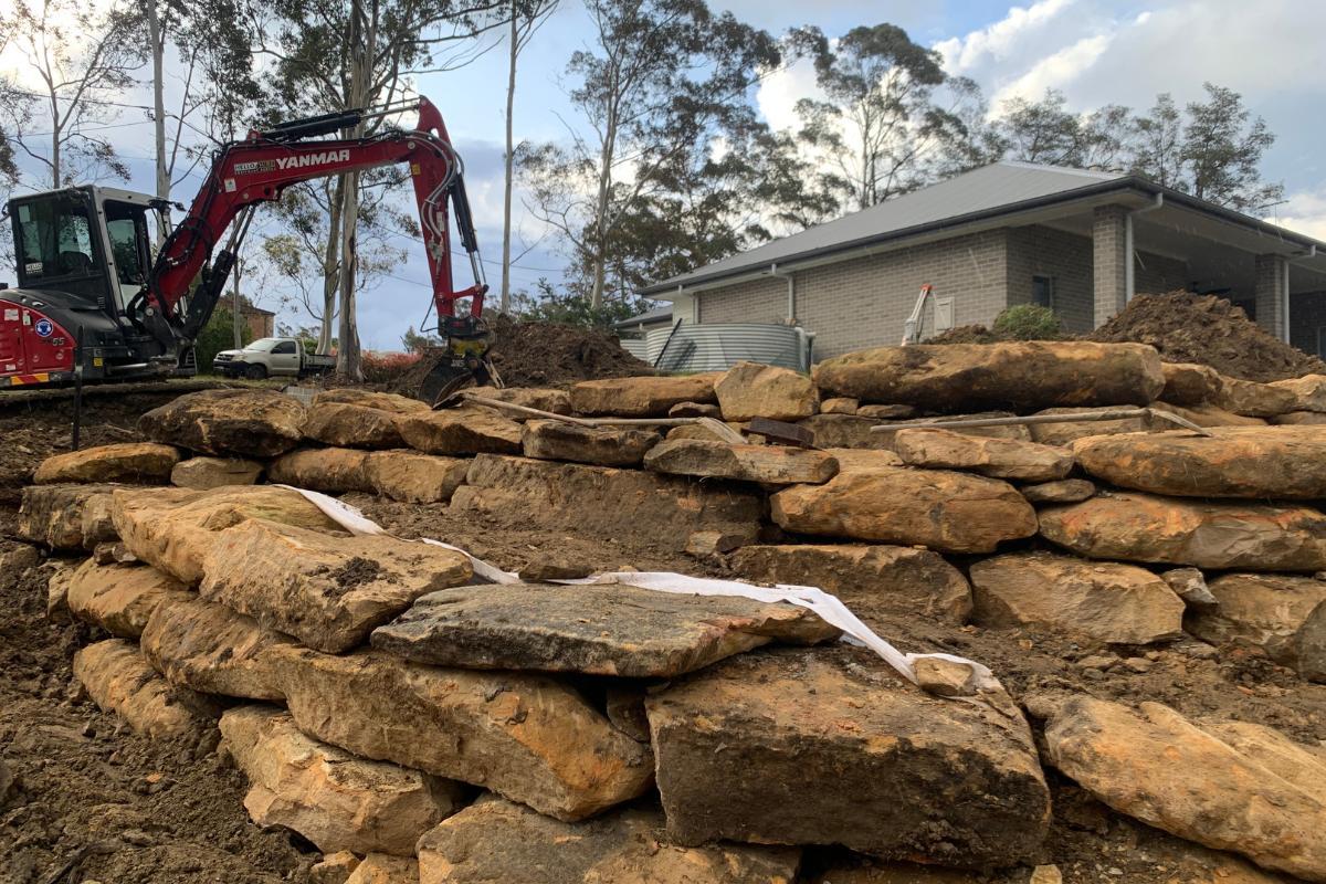 sandstone wall blue mountains