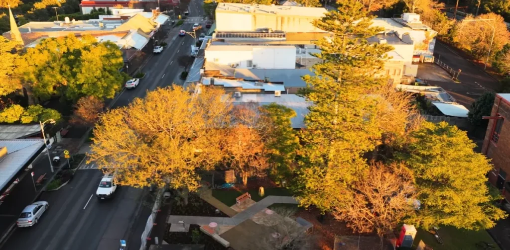 Aerial view of Telstra Park Springwood showing the new paths, seating and garden beds beside the main street